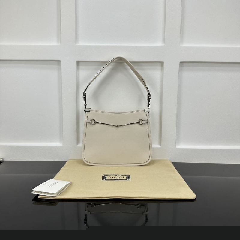 G*u*i top handle bags
